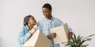 young couple moving new home together african american couple with cardboard boxes 1157 40314.jpg