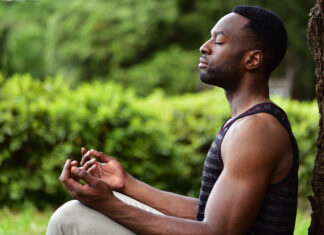 Young man meditating