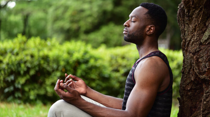 Young man meditating