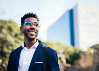 Portrait of dreamy young black man looking at infinity in a park