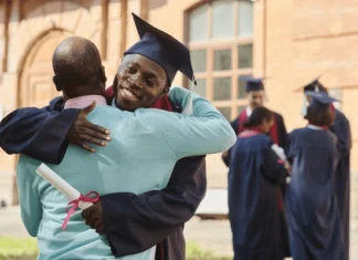 father congratulating his son graduation 600nw 2360923061.jpg