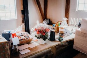 variety of gifts on wooden table variety of gifts on wooden table
