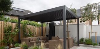 a patio with a couch and a table in it