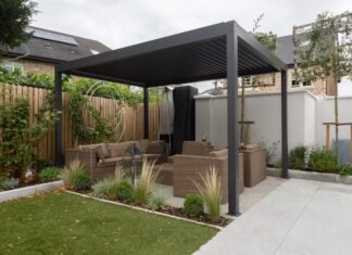 a patio with a couch and a table in it