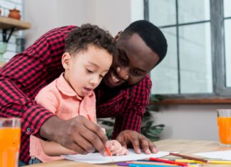 black father son drawing table