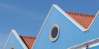 blue building with two round windows