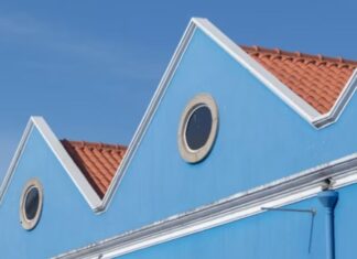 blue building with two round windows