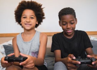 two-brothers-playing-video-games-home