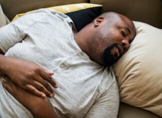 man asleep his bed 53876 25139.jpg